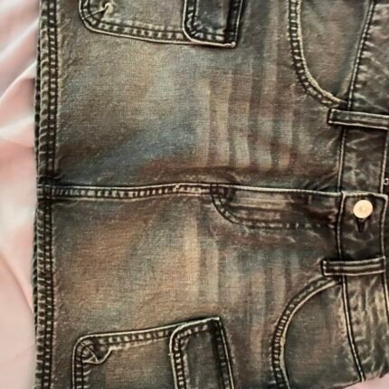 Mini falda jean gris con bolsillos