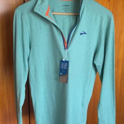 Polo training marca Brooks